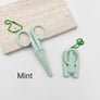 Portable folding scissors with sheath