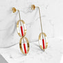 Asymmetrical Martin Earrings