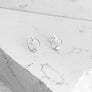 Open Circle White Topaz Solitaire Post Earrings